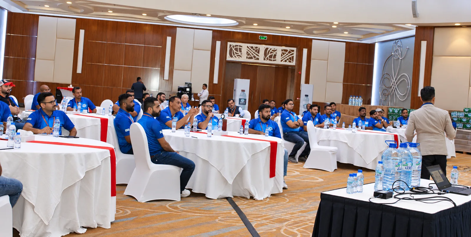 Al Ain product training session with a presenter and sales team